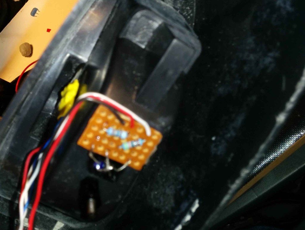 A1302 can just be seen tucked away with the board covered in yellow heatshrink. The sensor itself was left exposed to avoid the addition of another medium to "sense" through.